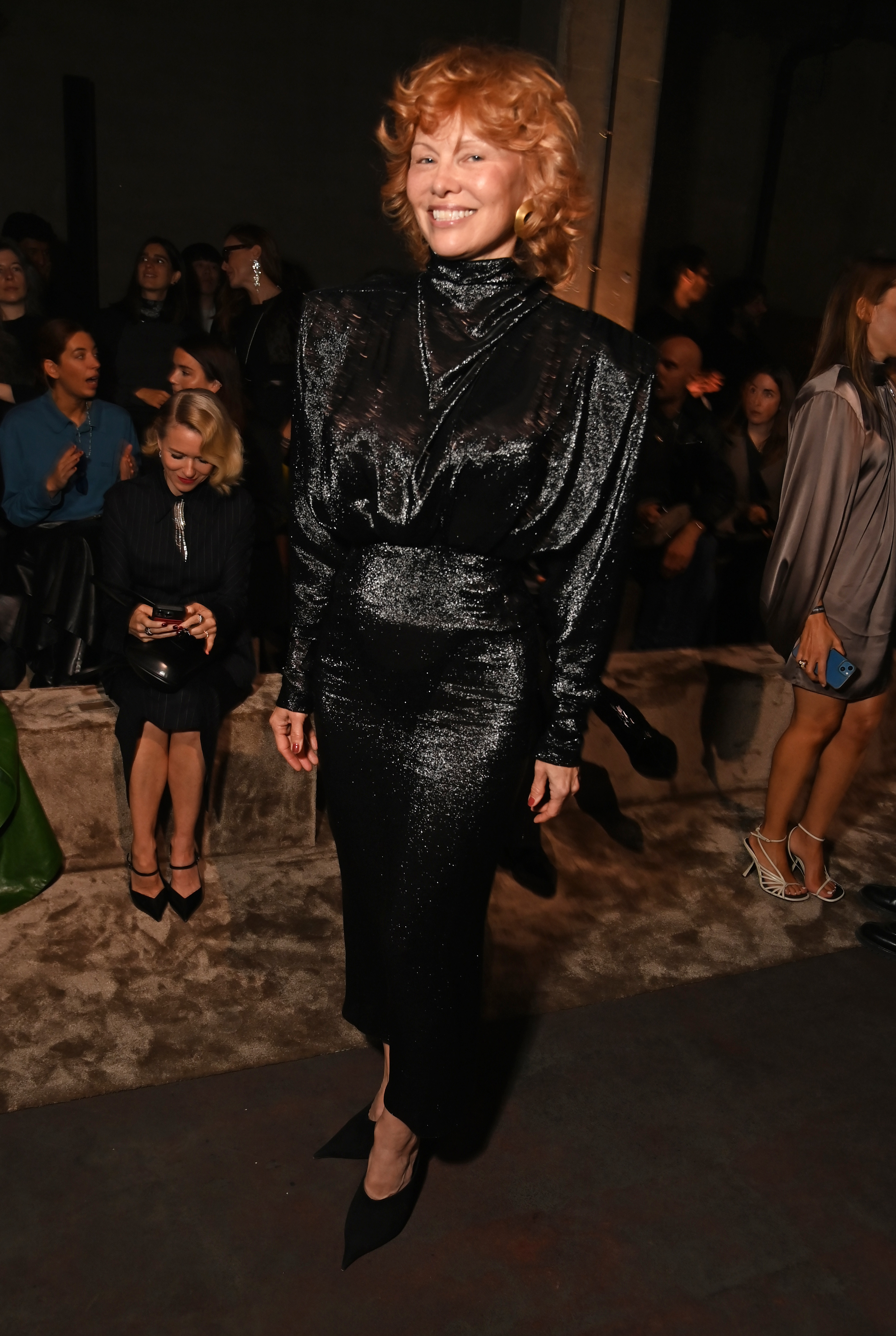pamela anderson wears a black dress to the mugler ss26 show