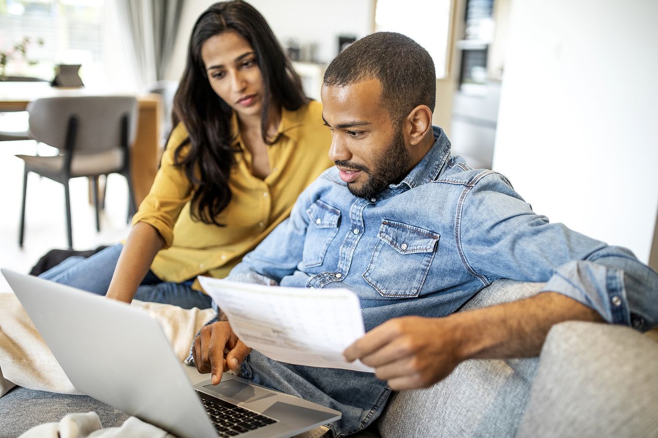 Young couple looking at finances