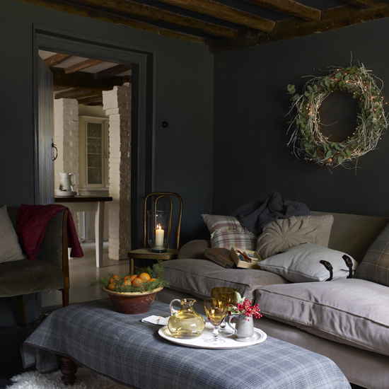 living room with wreath and sofa