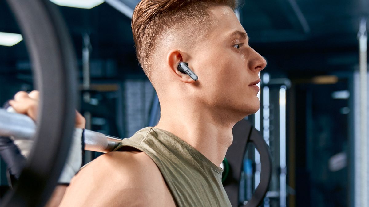 EarFun Air 2 being worn by man doing squats 