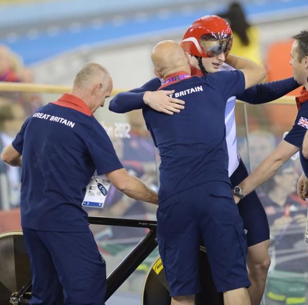 Dave Brailsford and Jason Kenny after gold was secured
