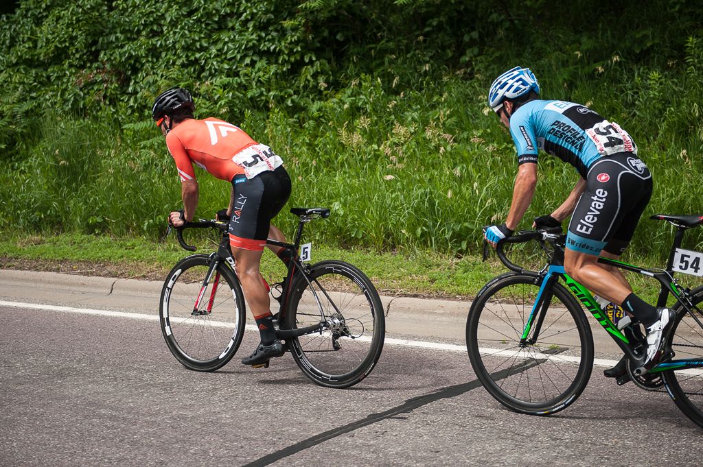 Evan Huffman (Rally Cycling) leads Joseph Schmalz (Elevate Pro Cycling p/b Bicycle World) up the climb on the finishing circuit.