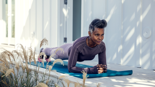 Woman doing a plant during exercise