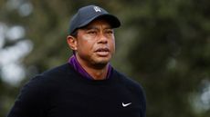 Tiger Woods wearing a black Nike sweater at the 2023 PNC Championship