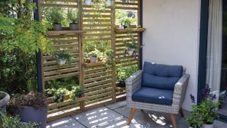 patio with slatted wall