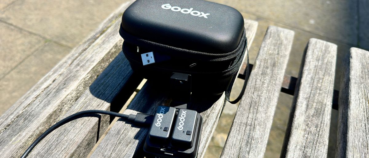 Godox Magic XT1 microphone case on a wooden slatted table