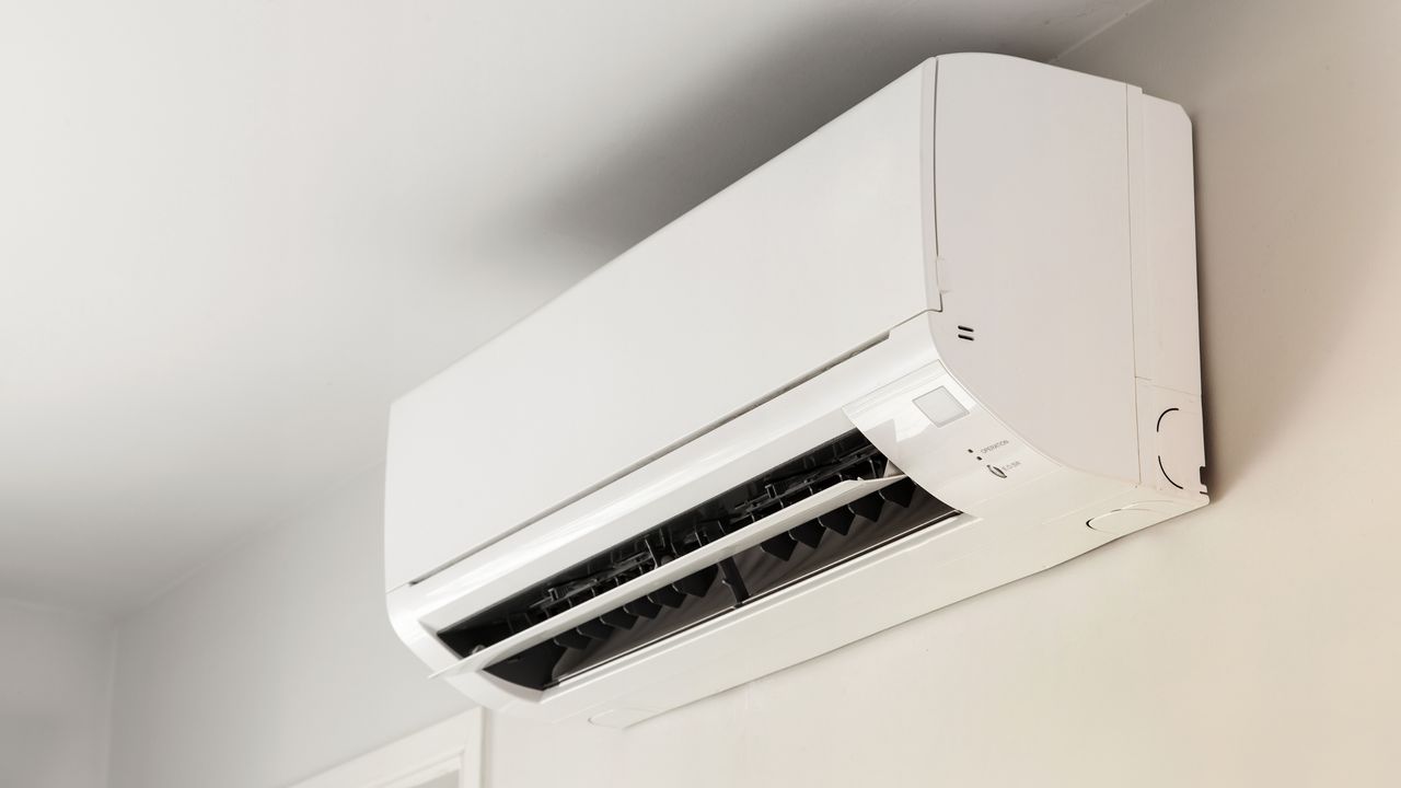 White air conditioner unit on wall