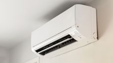 White air conditioner unit on wall