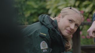 Ruby at work on outdoor shout in full paramedic uniform
