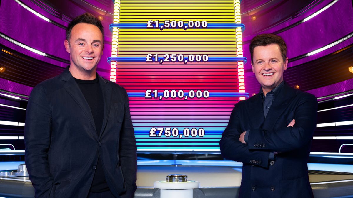 Ant and Dec wearing suits and standing in the studio smiling in Ant &amp; Dec&#039;s Limitless Win 