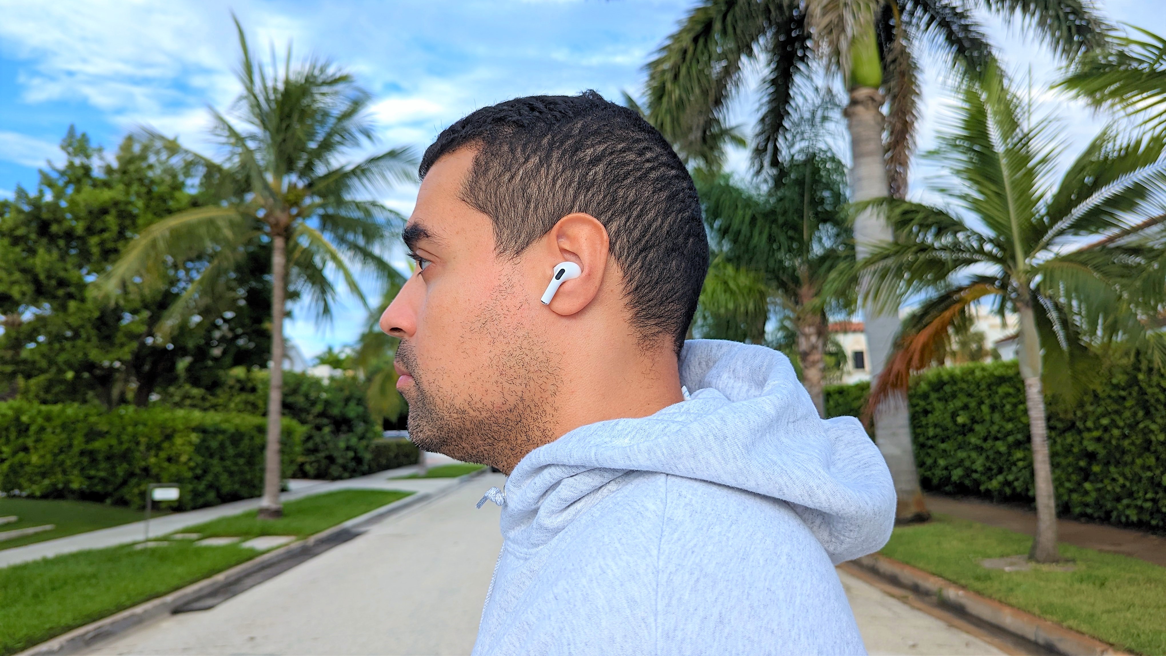 Reviewer wearing Apple AirPods Pro 2 on a run