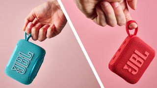 Person holding JBL Go 5 next to another person holding the JBL Go 4