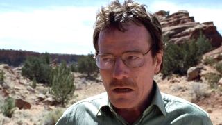 Walter White looking mad in the desert in Breaking Bad's premiere episode. 