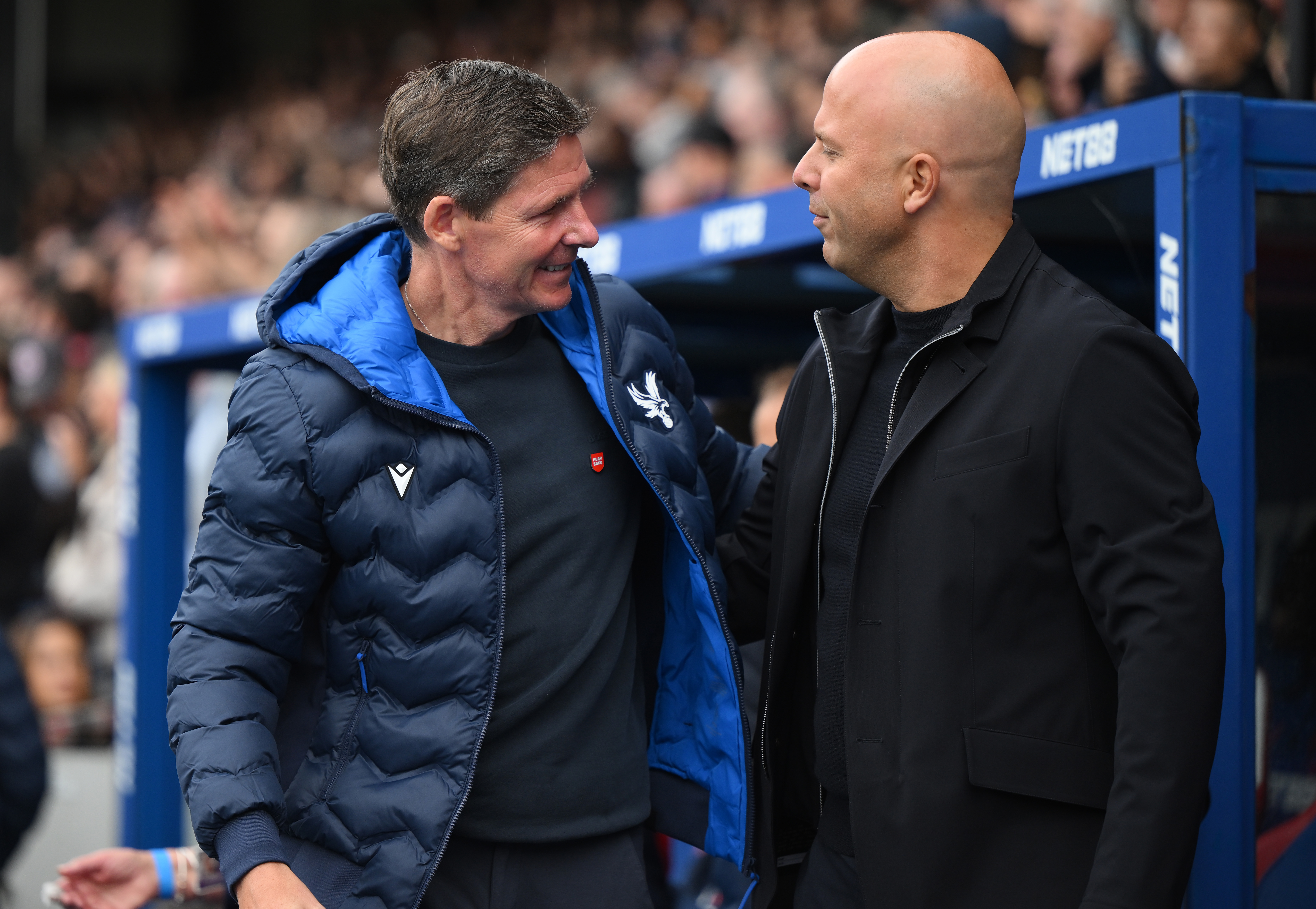 LONDON, ENGLAND - SEPTEMBER 27: Oliver Glasner, Manager of Crystal Palace, and Arne Slot, Manager of Liverpool, interact prior to the Premier League match between Crystal Palace and Liverpool at Selhurst Park on September 27, 2025 in London, England. (Photo by Alex Broadway/Getty Images)