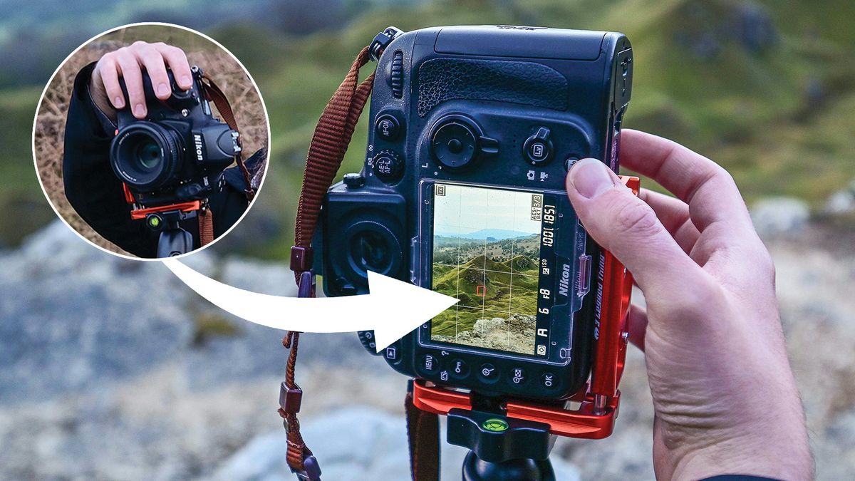 Roundel with front view of hand operating camera attached to tripod via L-bracket (inset). With arrow pointing to larger image of rear view of hand operating camera attached to tripod via L-bracket. The blurry scene behind is rural hills, which is displayed on the live view screen 