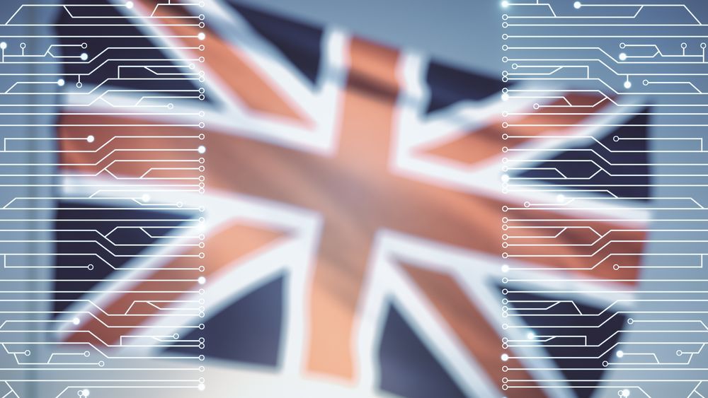 A blurred Union Jack flag behind digital imagery 