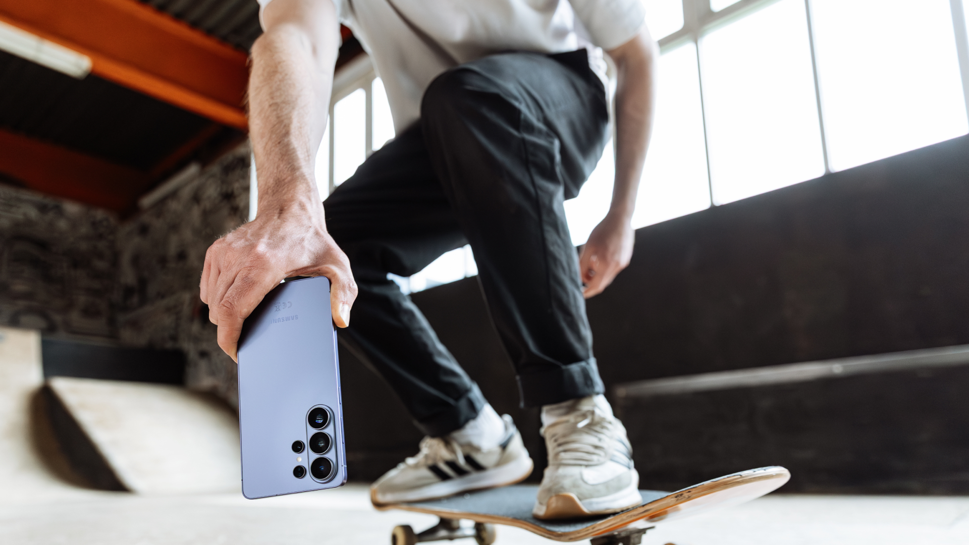 Samsung Galaxy S26 Ultra being used by person with skateboard