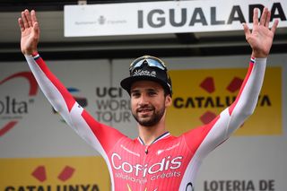 Cofidis' French cyclist Nacer Bouhanni celebrates on the podium winning the fourth stage of the 97th Volta Catalunya