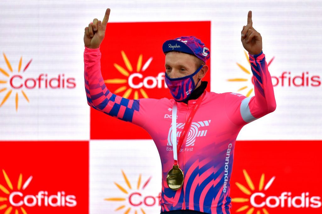 Team Education First rider Canadas Michael Woods celebrates on the podium after winning the 7th stage of the 2020 La Vuelta cycling tour of Spain a 1597 km race from VitoriaGasteiz to Villanueva de Valdegovia on October 27 2020 Photo by ANDER GILLENEA AFP Photo by ANDER GILLENEAAFP via Getty Images