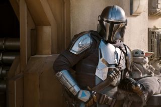 Mando and The Child as seen in Season 2 of The Mandalorian on Disney+.