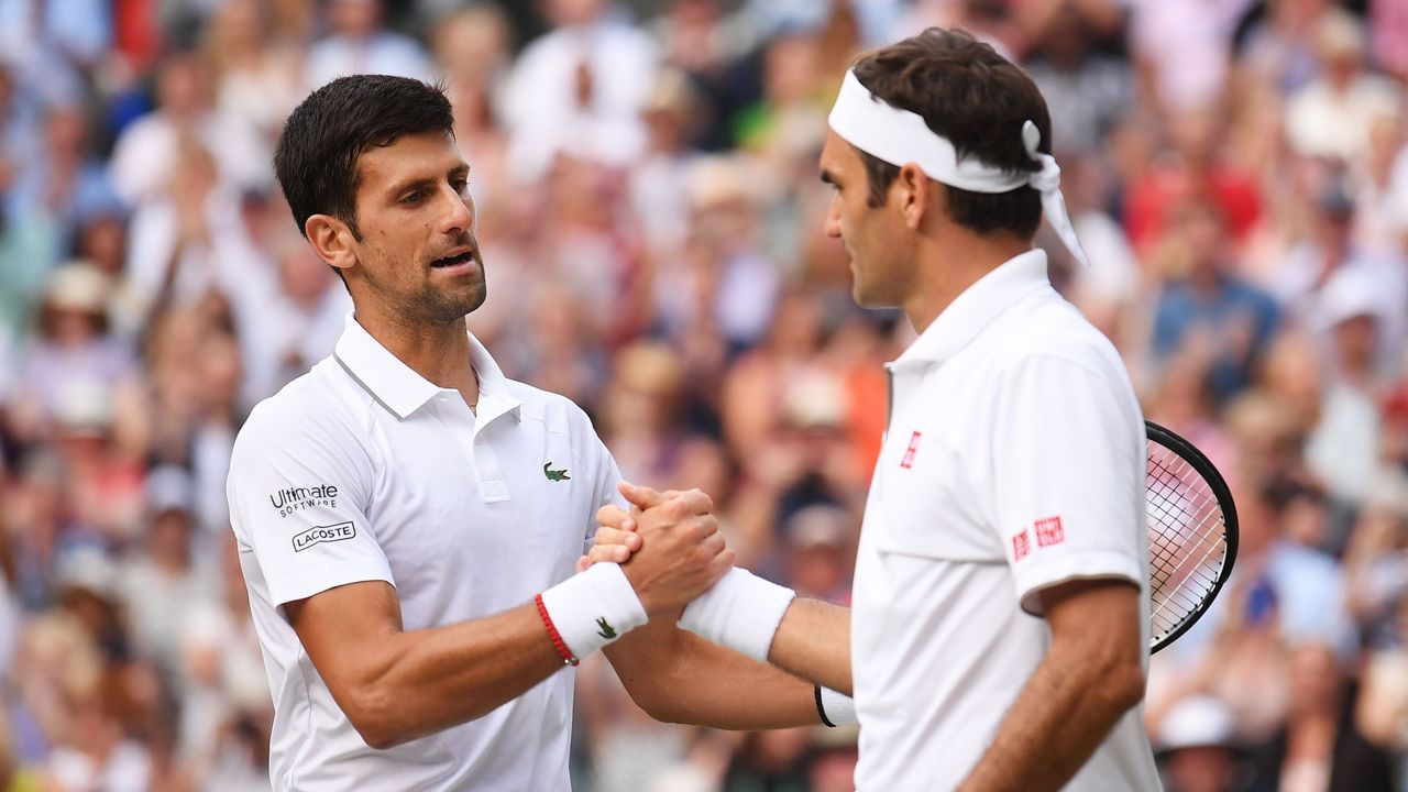 Novak Djokovic shakes Roger Federer&amp;#039;s hand after winning the 2019 Wimbledon men&amp;#039;s singles final