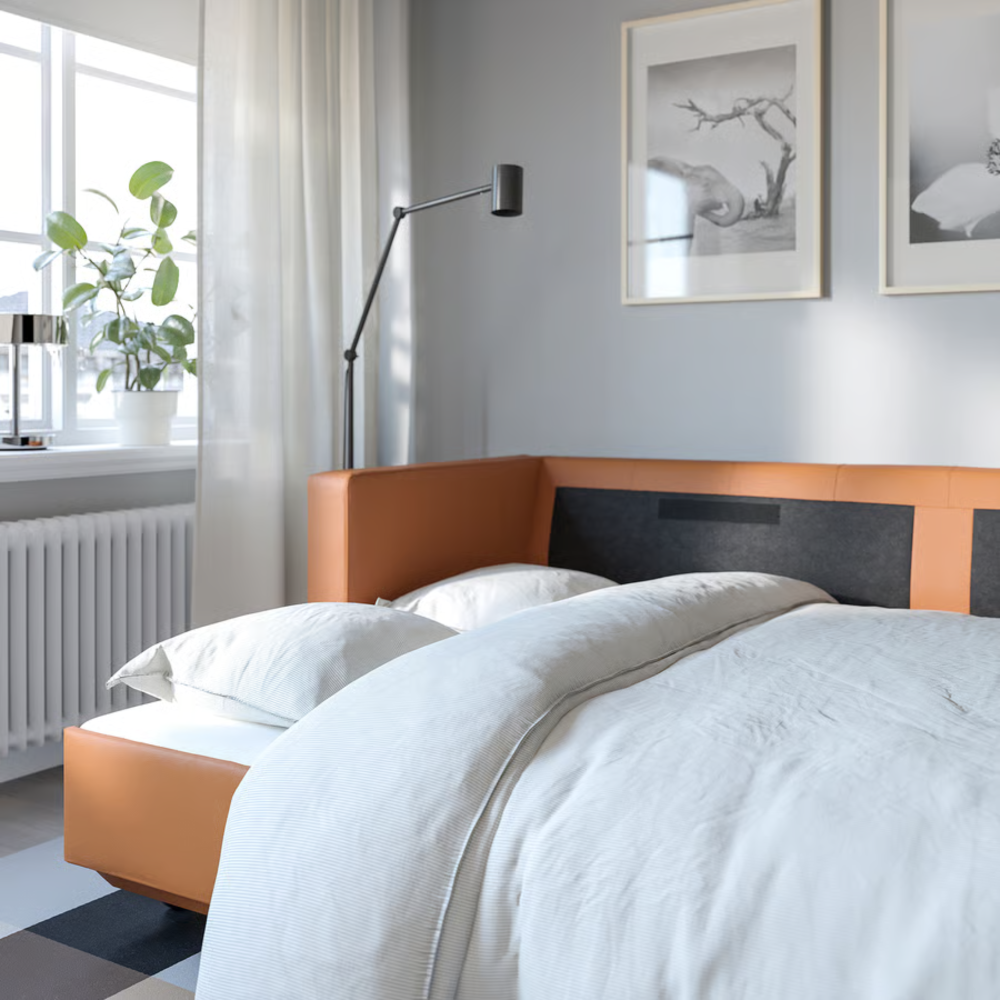 IKEA LANDSKRONA with white bedding on it.