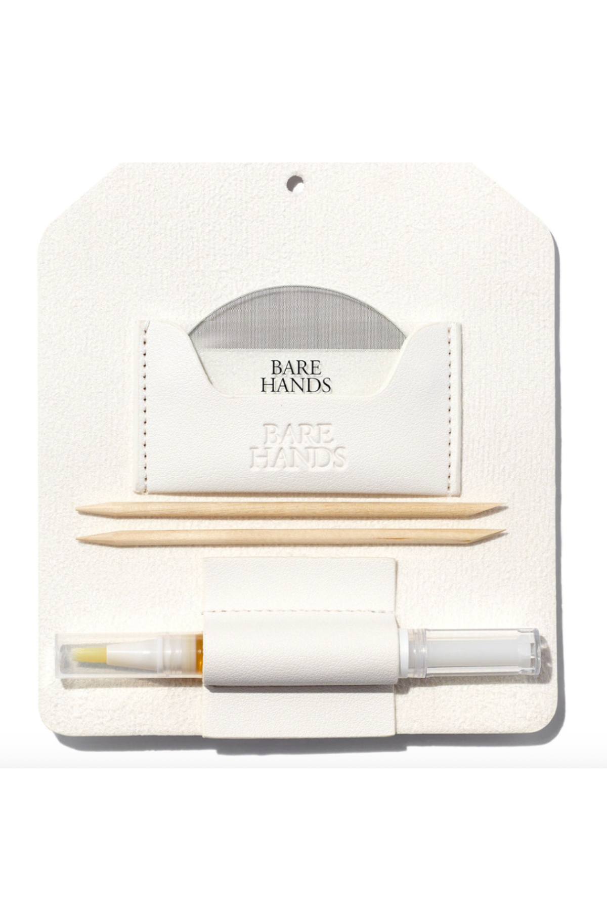 a white leather case with nail tools