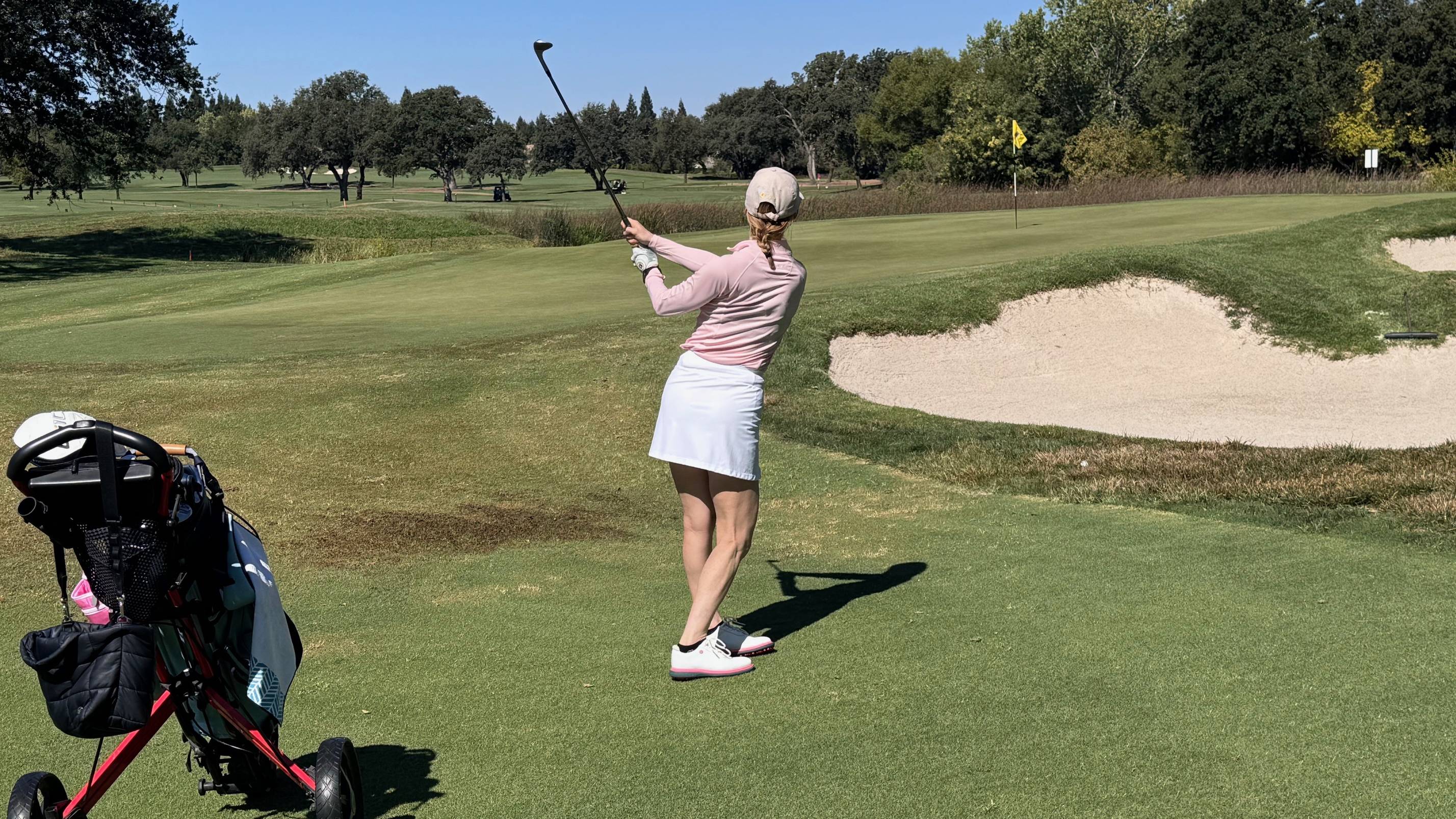 Lauren Katims hitting a fairway shot