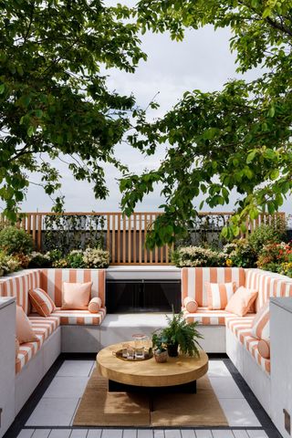 small roof garden with sunken seating in striped coral print