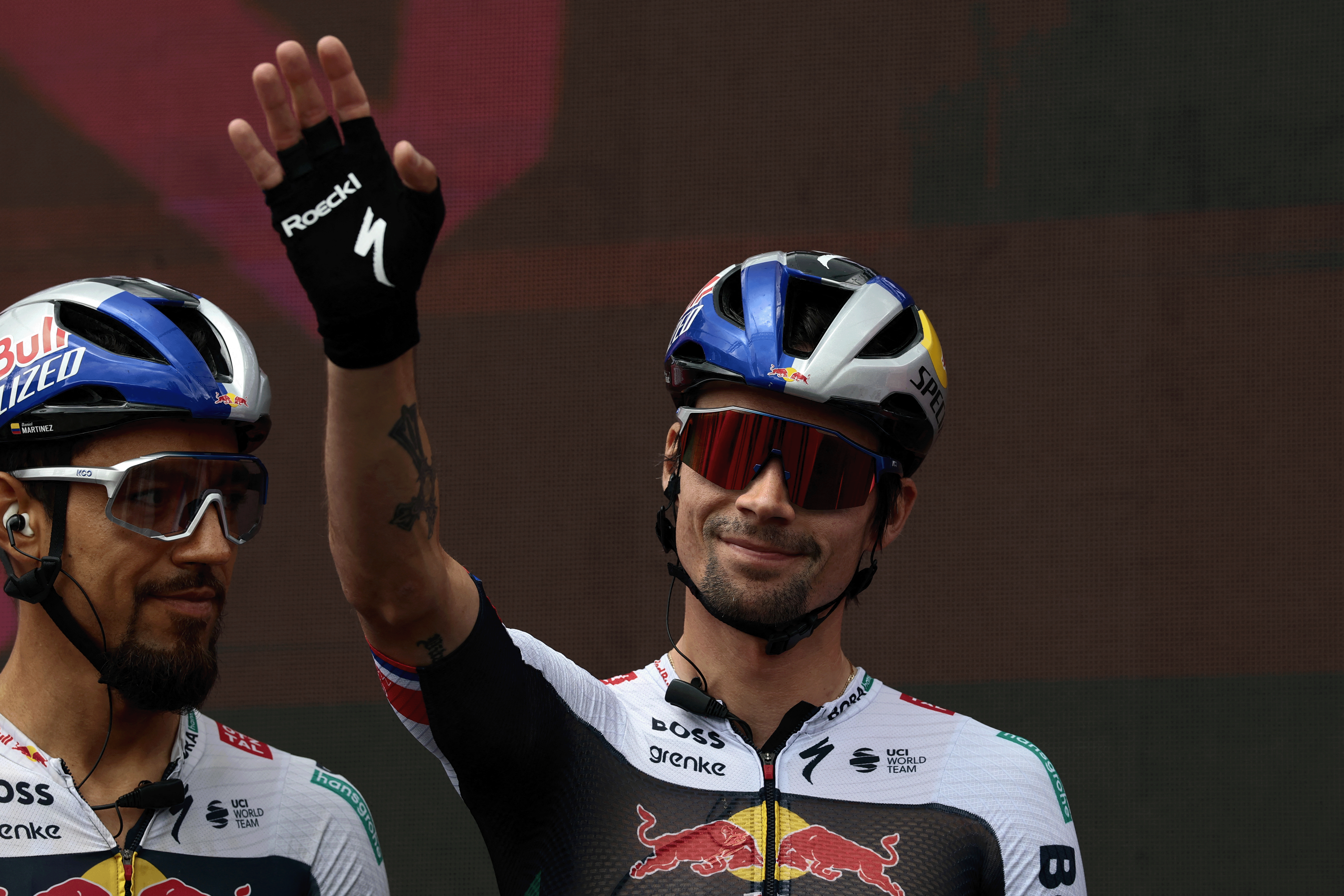 Red Bull-Bora-Hansgrohe's Slovenian rider Primoz Roglic waves during the ceremony held ahead of the start of the 9th stage of the 108th Giro d'Italia cycling race of 181kms from Gubbio to Siena on May 18, 2025. (Photo by Luca Bettini / AFP) (Photo by LUCA BETTINI/AFP via Getty Images)