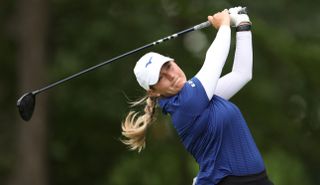 Bailey Tardy strikes her tee shot with a driver