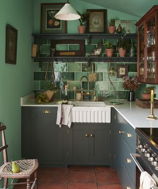 Green shaker style kitchen by deVOL Kitchens