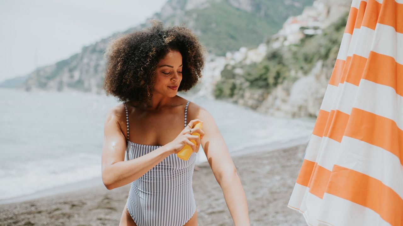 does spf expire - Woman applying sun cream 