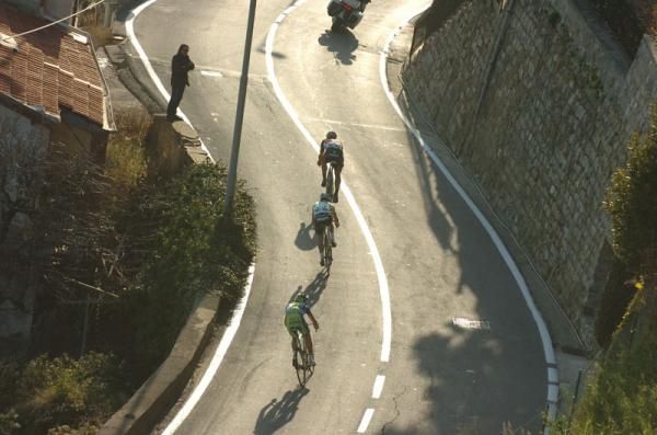 The three leaders head down the Poggio
