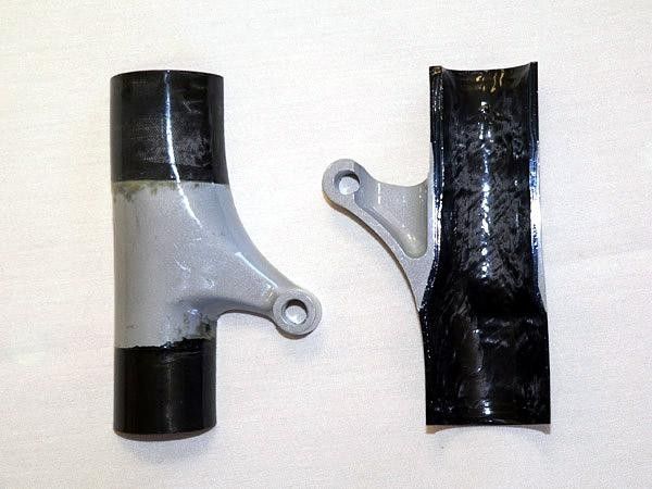 The linkage mount actually completely surrounds the seat tube for maximum reliability.