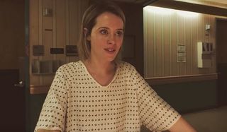 Unsane Claire Foy looking distressed in a hospital gown
