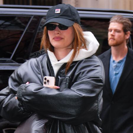 Hailey Bieber wears Fila Echappe metallic sneakers with athleisure.