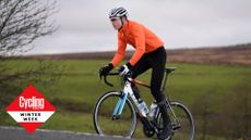 Image shows a rider wearing one of the best set of bib tights for cycling.