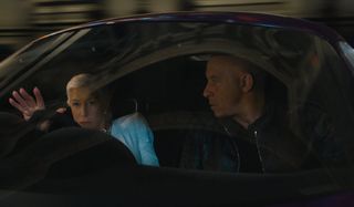 Helen Mirren drives as Vin Diesel watches in F9.