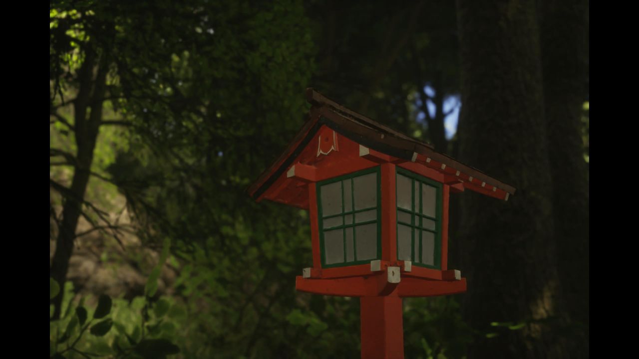 Screenshot of the photography simulator game Lushfoil Photography Sim, depicting red shrine in Japan