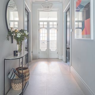 Hallway with large tiled flooring
