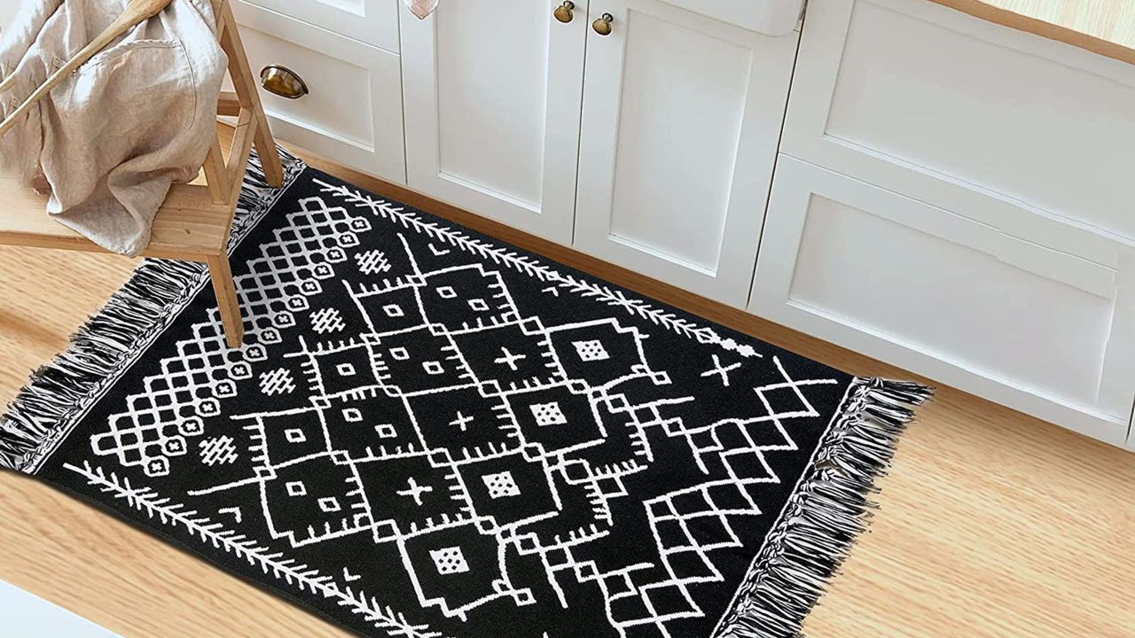 Iohouze boho black Runner Rug with Tassels in kitchen on floor