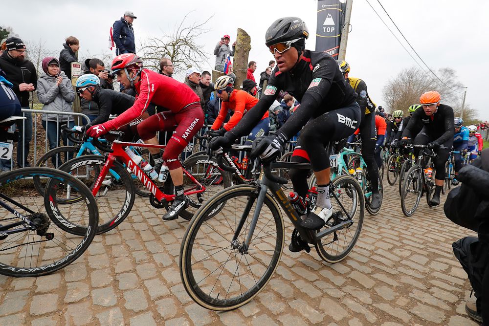 Greg Van Avermaet (BMC Racing) bundled up against the cold in the early going at Tour of Flanders