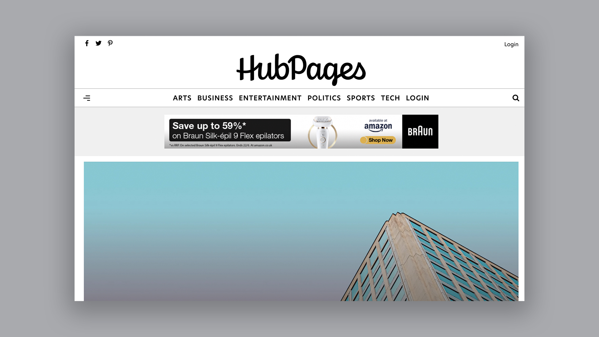 Homepage of Hubpages, one of the best blogging platforms, featuring photo of tall building