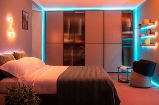 a bedroom with led lighting