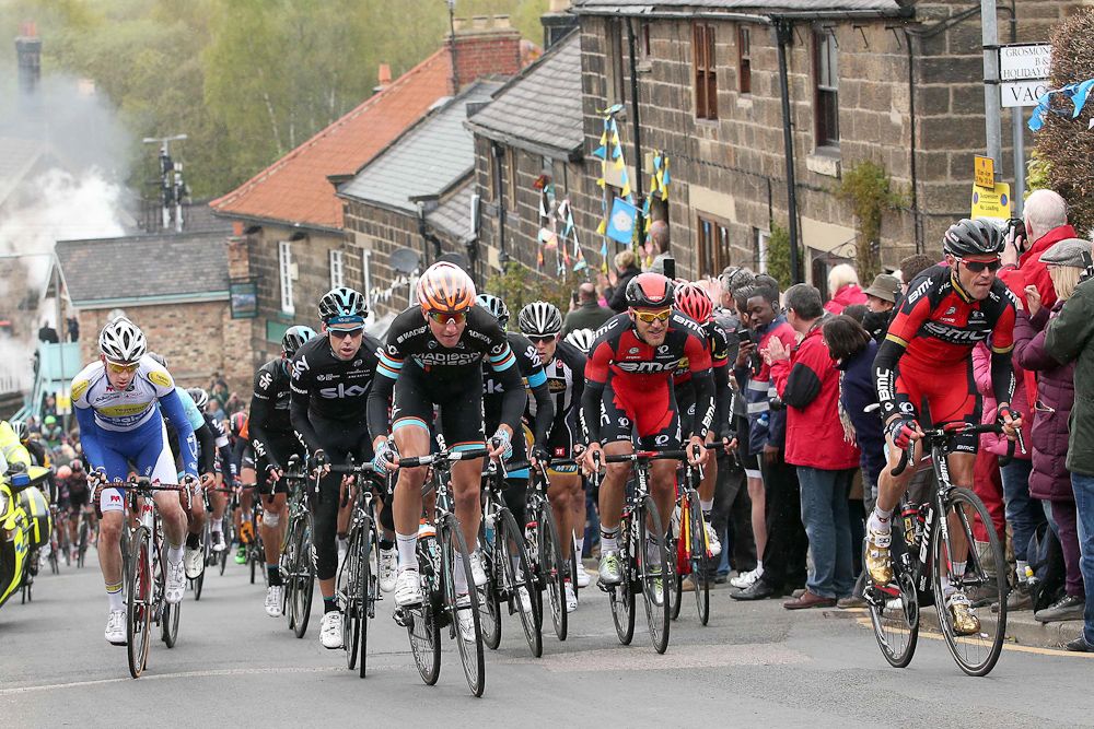 Riders climb a steep section in Yorkshire.
