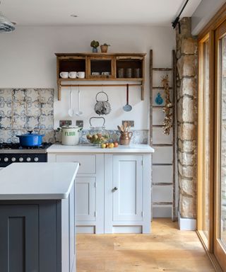 Neutral Shaker style country kitchen in Devon barn