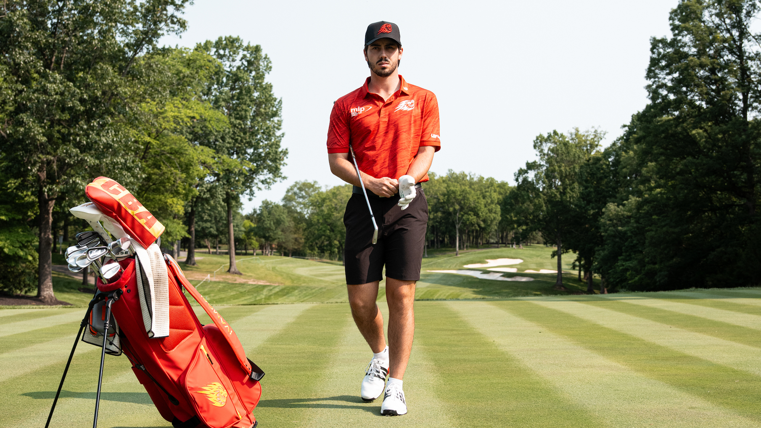 Josele Ballester walks towards the camera while wearing Fireballs GC apparel after signing for the LIV Golf League club