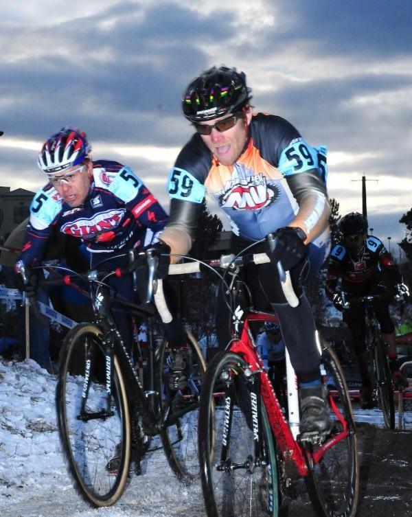 Wes Swearingen (Mountain View Cycles) racing on snow as darkness approaches.