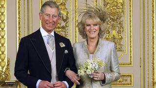 WINDSOR, ENGLAND - APRIL 9: (EMBARGOED TILL 0001 BST MONDAY 11 APRIL 2005) TRH Prince Charles and The Duchess Of Cornwall, Camilla Parker Bowles pose in the white drawing room for the Official Wedding group photo following their earlier marriage at The Guildhall, at Windsor Castle on April 9, 2005 in Berkshire, England.
